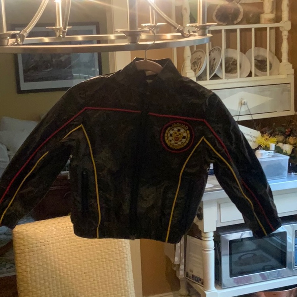 Boy black jacket with jaguar logo size approx 2T